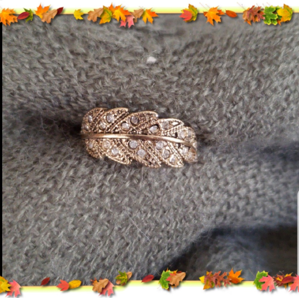 Gold colored feather ring